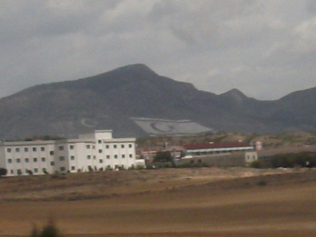 "Turkish Republic of Northern Cyprus" flag painted on hillside